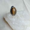 SURYA TIENDA HOLISTICA - www.suryatiendaholistica.com.ar - anillo de alpaca con piedra ojo de tigre